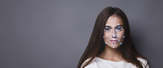 Aufkleber - Biometric verification. Facial recognition of young woman via polygon mask on face, panorama with copy space