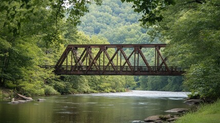 Poster - Rustic iron bridge spanning a calm river, nestled within a lush green forest.