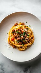 Wall Mural - Spaghetti served with fresh herbs on a white plate in a minimalist setting