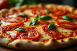 © Grigoriy Lukyanov - Italian pizza with tomatoes and cheese close-up