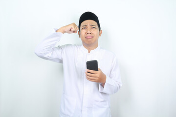 sad muslim asian man crying with holding phone