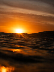 Wall Mural - sunrise view from the middle of the ocean.
