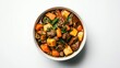 © altitudevisual - Bowl of hearty beef stew with carrots, potatoes, and greens on a white background