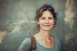 © Serhii - Charming Portrait of a Joyful Aged Woman in Casual Attire, Smiling Against a Soft Background