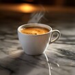 © Tanakrit - A steaming cup of coffee sits on a marble surface, inviting warmth and comfort with its rich aroma and inviting appearance.