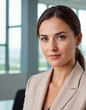 © pecherskiydotkz - Consultant in front of a bright office background. Banner with space for text or layout
