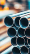 © AngrySun - Close up of stack of stainless steel pipes. Metallurgy industry concept. Generative AI