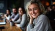 © ZeNDaY - Engaging group shot of a smiling businesswoman in a modern office environment highlighting professional connections and team spirit