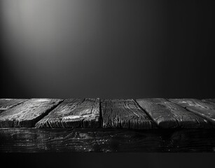Poster - Dark Wooden Table Against Black Background