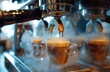 © Riz - Espresso Machine Brewing Coffee Into Glass Cups