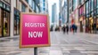 © Wasana - Register sign and signup conceptual. A vibrant sign reading 'REGISTER NOW' stands prominently in a bustling shopping district, inviting passersby to take action in a lively urban setting.