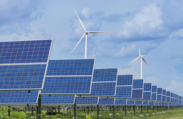 Wall Mural - solar panels with wind turbines generating electricity in hybrid power plant systems station , clean
