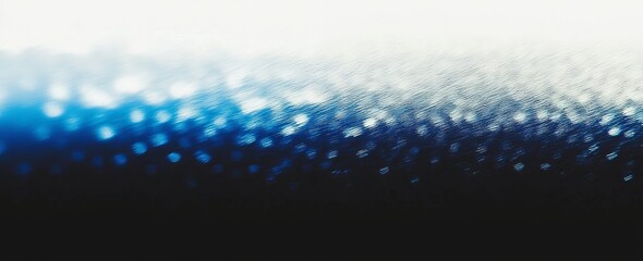Fototapete - A large banner featuring a grainy, noise-textured background with a blurred abstract gradient of teal, blue, green, white, and black, illuminated by glowing light.