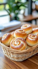 Wall Mural - Freshly baked soft rolls served in a woven basket at a cozy cafe setting