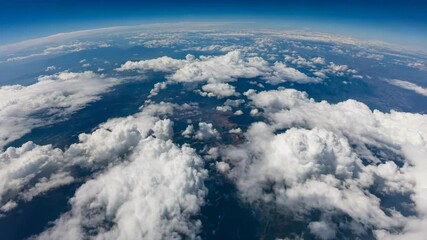 Wall Mural - Curvature of planet earth. Aerial shot. Blue sky and clouds