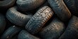 © Ahmad - Worn and dirty rubber tires showcase a collection of old, used rubber tires, presenting their rugged texture and character, perfect for highlighting the appeal of old rubber tires in various settings.