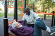 © Marko Geber - Senior male friends working out at outdoor exercise park
