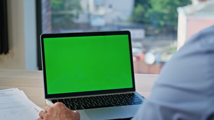 Wall Mural - Office manager working mockup laptop at workdesk closeup. Unknown man freelancer