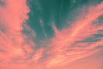 Wall Mural - pink green cloudy sky at sunset. sky texture. abstract nature background