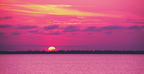 Wall Mural - seascape in the early morning. sunrise over the sea. nature landscape