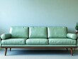 © Vadym - Light mint green leather sofa against pale blue wall. Empty living room. Interior design with mid-century modern style. Trendy home decor. Cosy, stylish. Empty space for copy. Retro living room