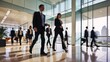 © MatStudio - abstract motion blur image of business people crowd walking in city downtown. Dramatic color tone