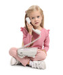 © New Africa - Cute little girl with telephone on white background