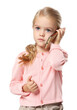 © New Africa - Cute little girl talking on smartphone against white background