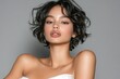 © Ceballos - Beautiful young woman posing with short black hair and glossy lips