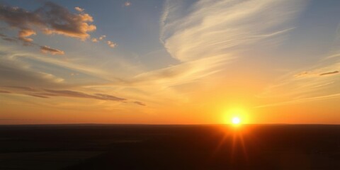 Wall Mural - vibrant sky with golden sun rising over the horizon, casting a warm glow on the landscape below, sun