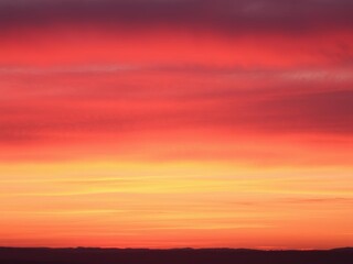 Wall Mural - vibrant gradient of pink, orange, and purple hues blending together in a beautiful sunset display, c