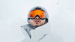 © Mariana Mejia - Snowboarder wearing orange goggles breathing in cold mountain air