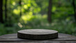 © Jhati - Circular wooden platform on a table surrounded by lush greenery during daylight hours