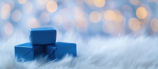 Aufkleber - Blue gift boxes on soft white fur with a blurred bokeh background creating inviting space for festive greetings and holiday celebrations.