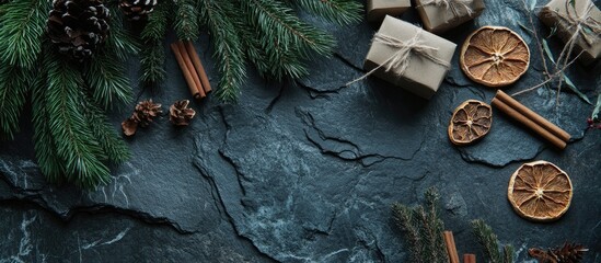 Aufkleber - Festive Christmas and New Year arrangement with handmade gifts dried oranges cinnamon and fir tree on dark stone background