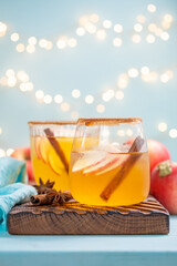 Wall Mural - Two glasses of a drink with cinnamon on top