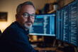 © Юля Бурмистрова - Man working on computer programming in a modern office environment at night. Generative AI