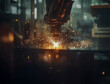 © DBFilms - Sparks fly as an industrial robot arm performs a welding operation in a dark, modern factory setting.