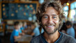 © Aquir - Teacher. Portrait of a happy handsome male teacher in the classroom