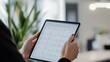 © Media Srock - Digital Spreadsheet on Tablet Screen in Office Environment