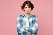 © ViDi Studio - Young sad serious frowning woman wear blue shirt white t-shirt casual clothes hold hands crossed folded looking camera isolated on plain pastel light pink background studio portrait Lifestyle concept
