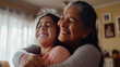 © Nataliya - Cheerful Daughter Embraces Mother in Cozy Home Setting