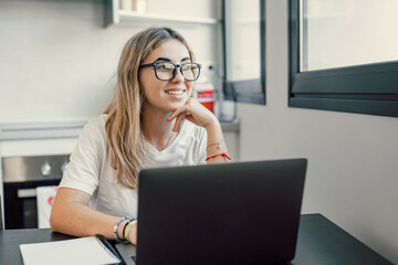 Wall Mural - Smiling young caucasian business woman head shot portrait. Thoughtful millennial businesswoman looking away with pensive face, dreaming, thinking over project tasks, future lifestyle.