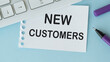 © Pawel - New customers text concept write on paper notebook