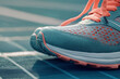 © pavlofox - Close-up of running shoes on a track during morning exercise