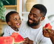 © Lumos sp - child family kitchen food boy son father watermelon fruit slice summer organic meal fun preparing healthy diet eating home black