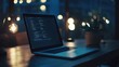© creativeideh - Laptop displaying lines of computer code at night