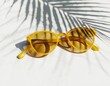 © Антон Сальников - These summer sunglasses show reflections of tropical palm trees.