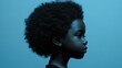 © Lion - A child with short afro curls, natural texture