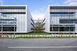 © ADDICTIVE STOCK - Modern hospital center with sleek architecture under blue sky